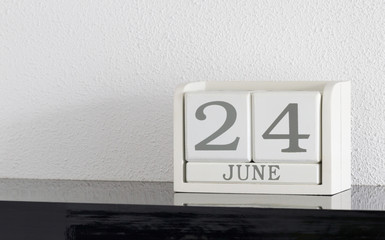 White block calendar present date 24 and month June