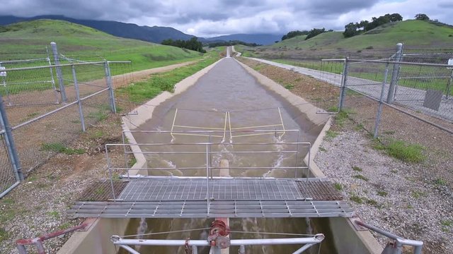 The Robles diversion aqueduct floods during intense storms near Ojai, California.