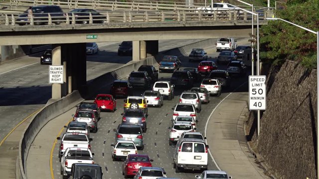 Morning eastbound traffic under overpass on the H-1 Freeway in Honolulu, Hawaii