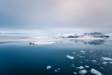 Winter landscape view of popular Glacier Lagoon with many small icebergs - Jokulsarlon, east Iceland.