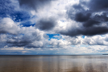 Naklejka na ściany i meble Clouds over gulf of Riga, Baltic sea.