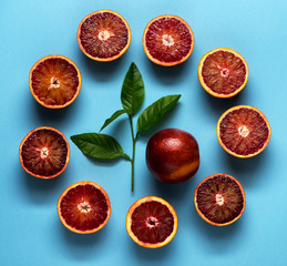 Сitrus fruits on a blue background. Fruits food background. Healthy eating and diet....