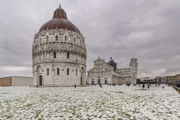 The famous square Piazza dei Miracoli after a snowfall, Pisa, Tuscany, Italy