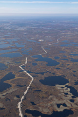 Top view of gas pipeline in endless swamps in tundra