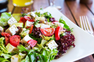 Greek Mediterranean salad with feta cheese, tomatoes and peppers