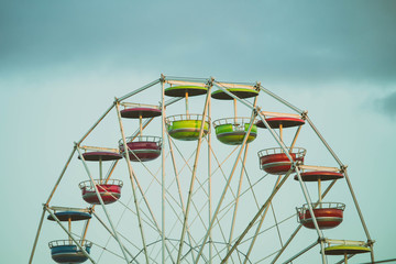 a ferris wheel in vintage pastel colors