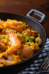 Traditional Spanish paella with seafood and chicken.