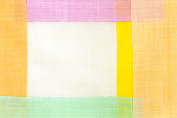 Traditional patchwork background of ramie fabric.