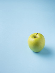 Fresh fruit Apple isolated on blue background
