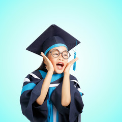 Little girl graduate with happy expression. Clipping path