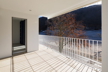 Modern house terrace with railing