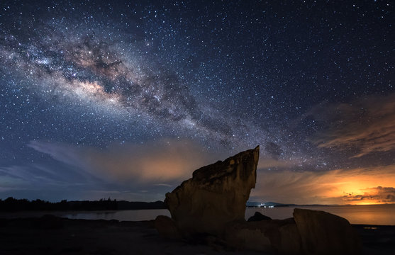 Seascape with Milkyway galaxy. image contain soft focus and noise due to long expose and high iso.