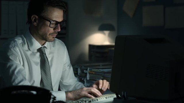 Businessman finishing his work and sending it