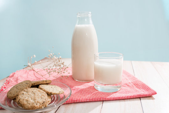 Dairy products. Pastry organic breakfast with milk and cookies.
