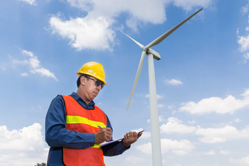 Electric Engineer writing report under Wind turbine power Generator