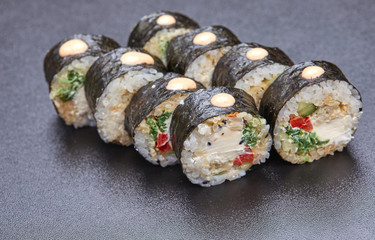 sushi on the black background