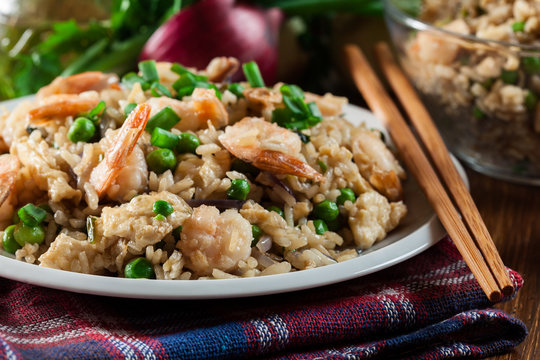 Fried rice with shrimp and vegetables served on a plate
