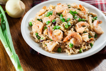 Fried rice with shrimp and vegetables served on a plate