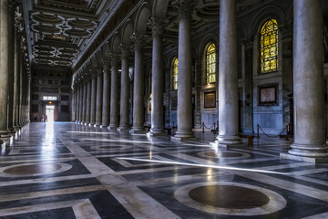 Obraz premium St. Paul’s Cathedral interior in Rome. Marble columns and ornate ceiling of St. Paul’s Cathedral in Rome, Italy. 