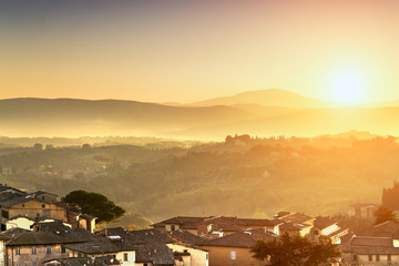 Obraz na płótnie Canvas Beautiful European village in the mountains at sunset