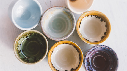 ceramic bowls for drinks close-up.  Ceramic ware made by own hands