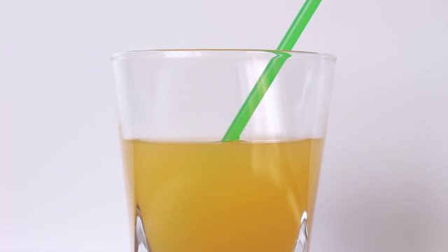 Drinking orange juice with tubule