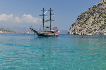 traditional Turkish ship (Gulet) in Porto Ceneviz bay on Mediterranean coast Antalya province, Turkey