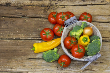 fresh vegetables on wooden background