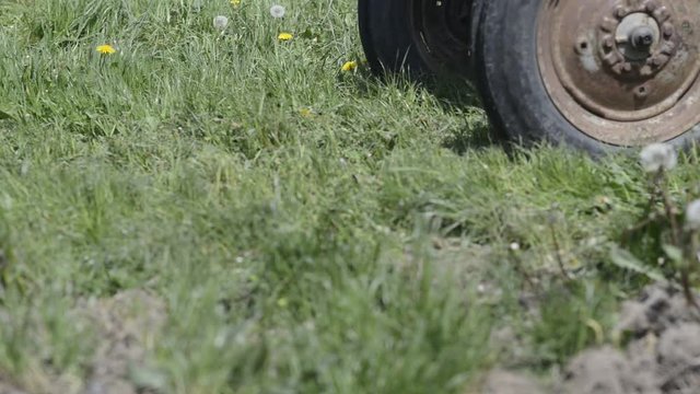 lawnmower at a greenfield