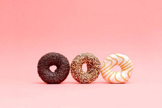 lots of beautiful donuts on blue background