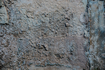 Alte Wand auf Mallorca, verwitterter Mörtel, Putz