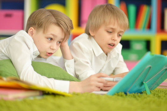 Two boys reading