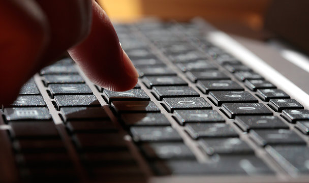 Woman Using A Computer Keyboard