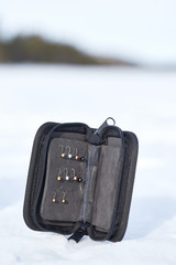 Tungsten ice jigs in case.