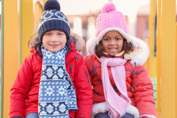 Cute little kids on playground. Child adoption