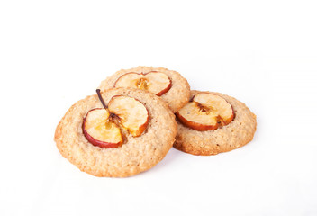 Oatmeal cookies / Oatmeal cookies with an apple on a white background