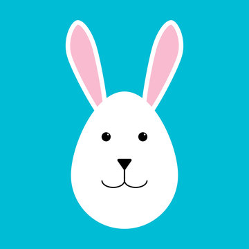 Happy easter. Easter rabbit on a blue background. Rabbit in the form of an egg