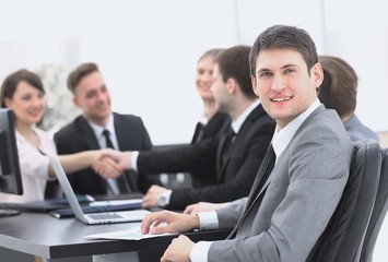 lawyer on the background of business partners handshaking