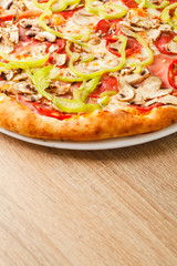 Pizza close up on a wooden table