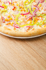 Pizza close up on a wooden table