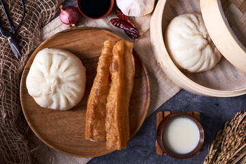 Chinese breakfast: Steamed buns (Baozi), fried breadsticks (yout