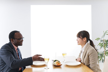Businesspersons enjoying meal 