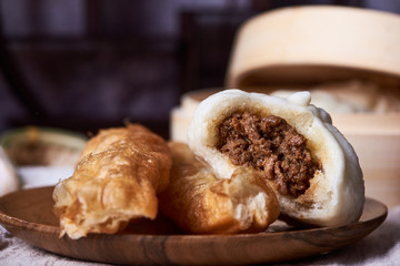 Chinese breakfast: Steamed buns (Baozi), fried breadsticks (yout