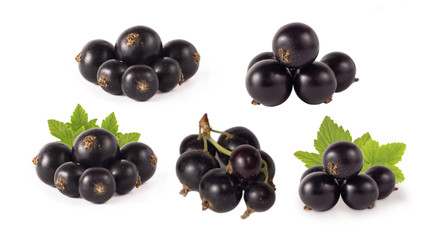 Set of blackcurrant isolated on white. Ripe and tasty black berry with copy space for text. Currants with leaves on a white background.