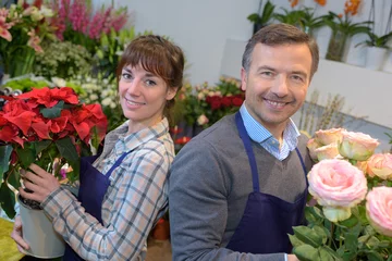 Aluminium Prints Flower shop male and female florists in flower shop