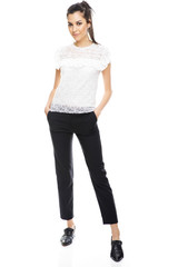 Full length portrait of beautiful female model in summer clothes collection.