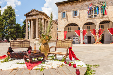 Croatia. Forum square decorated for the Days of Antiquity - Pula Superiorvm in old town of Pula. For a few days the streets of Pula are turned into a stage of a picturesque Roman theater.