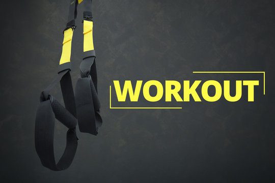 Straps training loop equipment. Black loop functional training equipment on grey background. Sport accessories. Fitness and Gym workout items for Healthy.