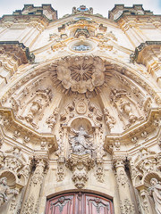 Fototapeta na wymiar Main facade of the The Basilica of Saint Mary of Coro in San Sebastian, Basque Country, Spain.