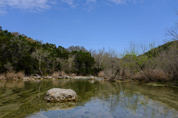 A view of Barton Creek Greenbelt Trail in Austin TX with Twin falls and Sculpture falls.